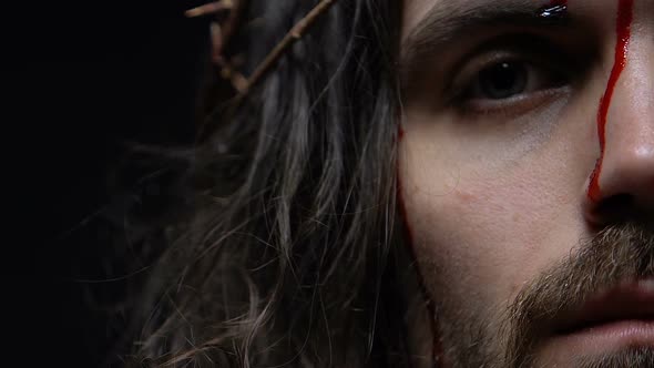 Jesus Christ With Bleeding Face Dying on Crucifixion, Punishment for People Sins