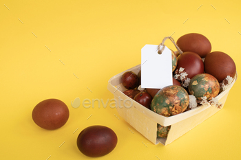 Easter Eggs in Basket with Tag