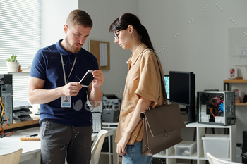 Checking smartphone of female client