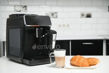 Modern coffee machine in kitchen