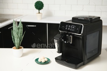 Modern coffee machine in kitchen