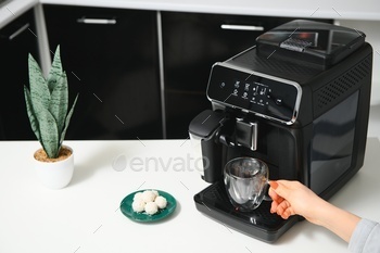 Modern coffee machine in kitchen