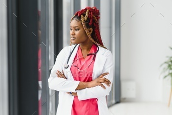 portrait of african female doctor at workplace.