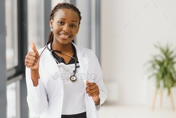 portrait of african female doctor at workplace.