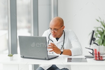 african american doctor in modern office