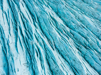 Blue ice glaciers with crevasses