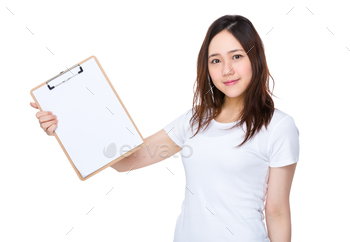 Young woman show with blank page of clipboard