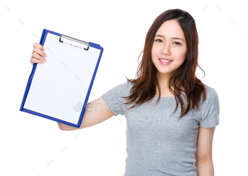 Asian woman showing the blank page of clipboard