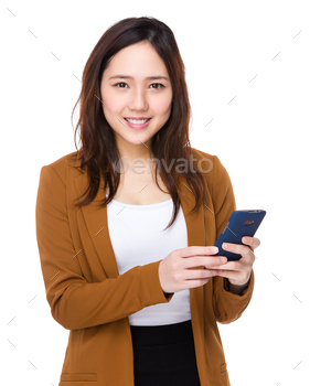 Businesswoman use of the mobile phone