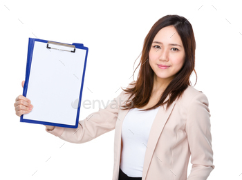 Businesswoman showing clipboard