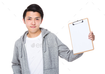 Young man show with the blank page of clipboard