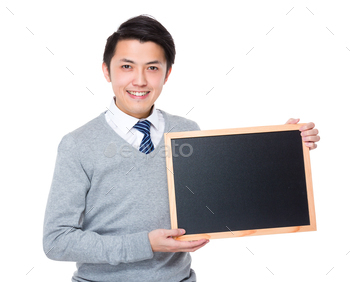 Young businessman show with chalkboard