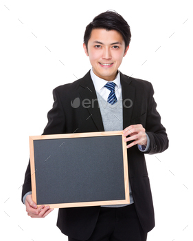 Young Businessman show with chalkboard