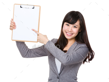 Businesswoman finger point to blank page of clipboard