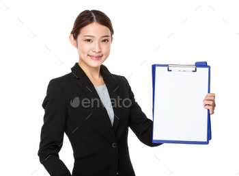 Asian Young businesswoman show with the blank page of clipboard