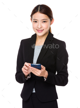 Young businesswoman use of the mobile phone