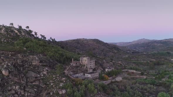 Drone aerial panorama of Termas Radium Hotel Serra da Pena at sunset in Sortelha, Portugal