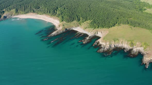 Drone flight above a picturesque rocky coastline