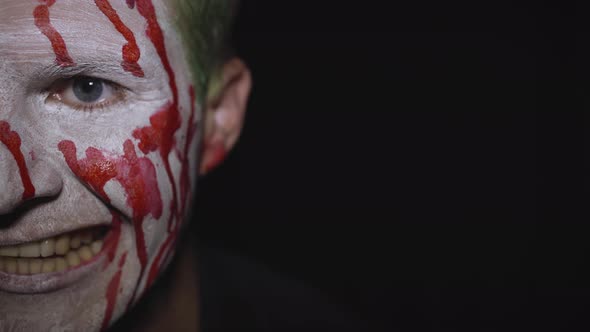 Clown Halloween Man Portrait. Creepy, Evil Clowns Blood Face. White Face Makeup