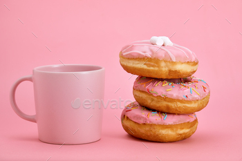 Colorful Donuts Breakfast Composition with Pink Color Styles. Game of colors, pink on pink. Sweet
