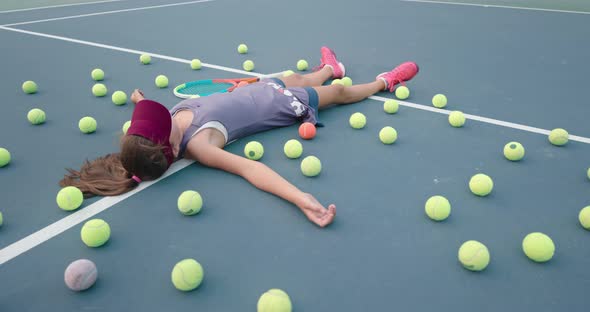 Kid Lying on Her Back and Moving Arms and Legs Out and in