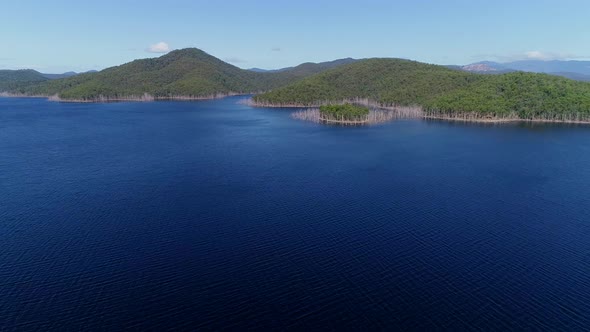 Wide Aerial Shot of large lake or reservoir