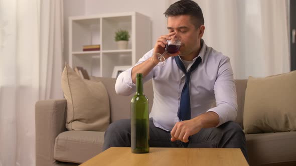 Alcoholic Pouring Red Wine To Glass at Home