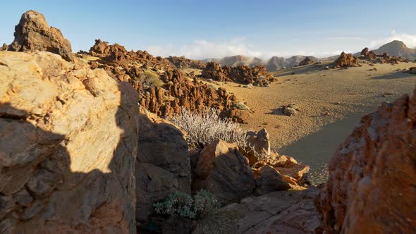 Сamera Moves Between Stones in Teide National Park, Tenerife. Volcano Landscape with Lava and Rocks