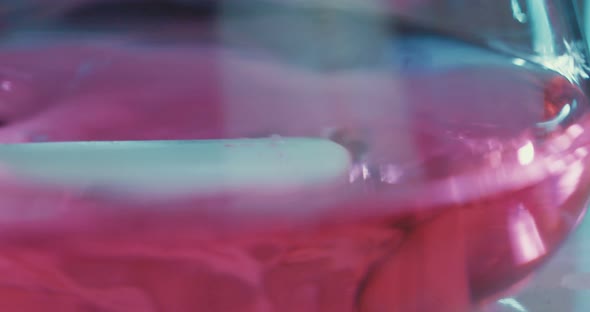 Slow motion of mixing chemicals inside a test tube