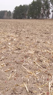 Vertical Video of a Field with Plowed Land in Autumn Slow Motion