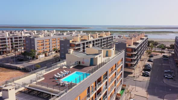 Aerial View of the Urban Area of Portugal in the South of Houses with Modern Infrastructure Swimming