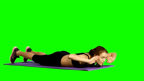 Sport Woman Abdominal Exercises on Fitness Mat. Green Screen, Gym