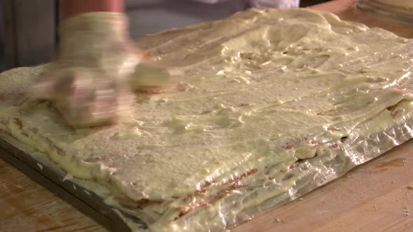 Baker Preparing Napoleon Cake