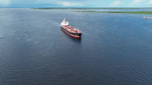 Freight ship sailing at Amazon River Manaus Brazil. Transportation.