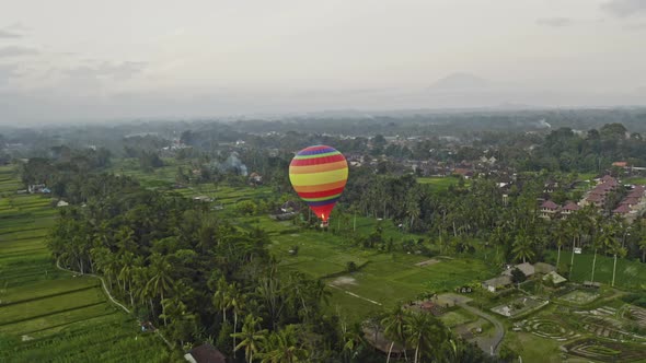 Drone With Hot Air Balloon Over Fields