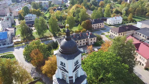 Latvia, Aluksne Old Lutheran Church With Golden Cock Statue on the Top of Tower, Aerial Dron 4K Shot