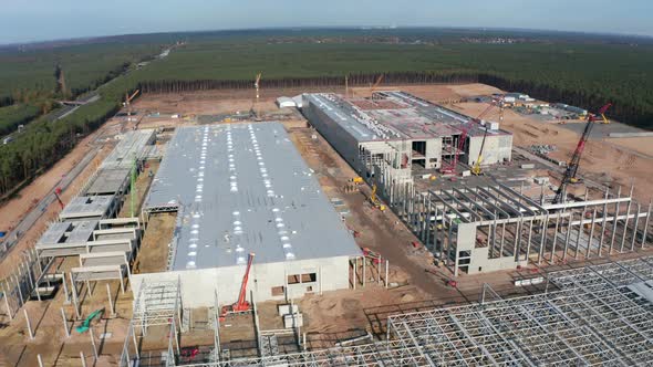 Huge Construction Site and Structures of Factory Building Being Built in Germany, Aerial View