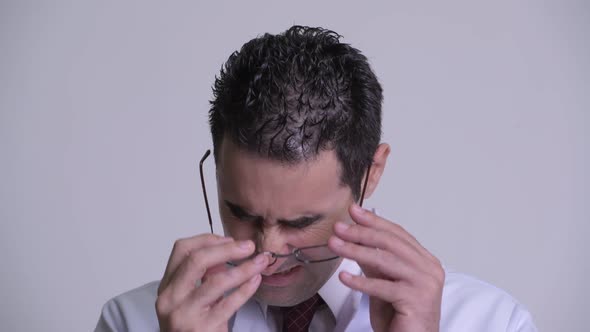 Stressed Man Doctor Removing Eyeglasses and Crying