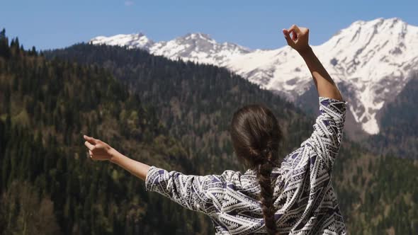 Woman Spending Time in Mountains.