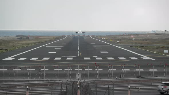 Airplane Landing at the Airport