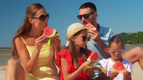 Happy Family Having Picnic on Summer Beach