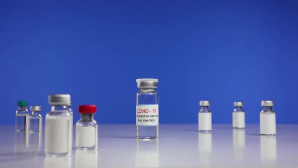 CoronaVirus Drug Vaccine Vials Receding and Approaching