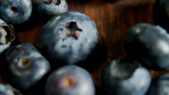 Fresh blueberries on wooden table 4k