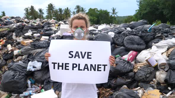 Woman Activist With Save The Planet Poster On Waste Dump. Recycle, Eco, Reuse.