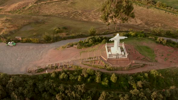4K daytime before sunset aerial drone view over Cristo Blanco, the famous white statue looking over