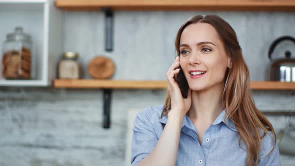 Close Up Face Adorable Blonde Girl Communicating on Telephone at Kitchen