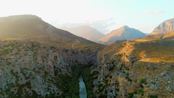 Beautiful Nature Aerial View of Canyon with River Palms and Mountains in Greece