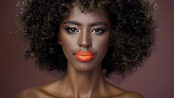 Beautiful Portrait of a Gorgeous African American Fashion Model with Bare Shoulders