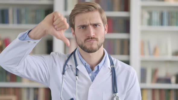 Portrait of Doctor Showing Thumbs Down Sign