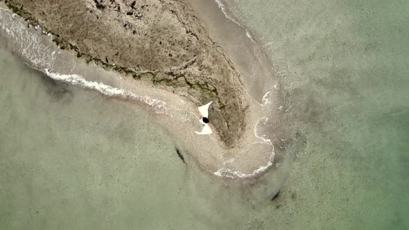 Bride at Uninhabited Sand Island in Ocean Reef  Drone High Ungraded Video